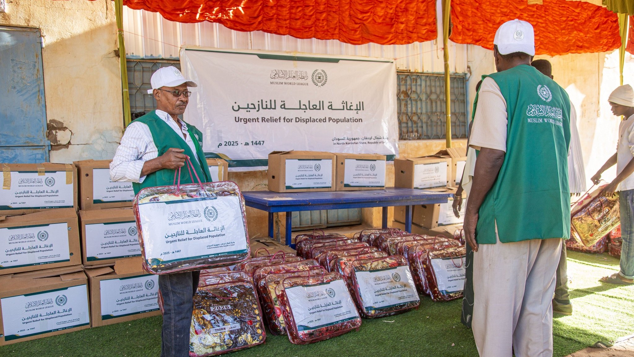 The Muslim World League continues to distribute aid in North Kordofan State, Sudan, to displaced persons fleeing the ravages of war in the city of El Obeid