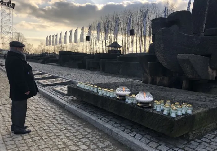 HE Dr. Mohammad Alissa along with Muslim dignitaries and delegates from  AJCGlobal placed candles at the International Monument at Auschwitz Museum