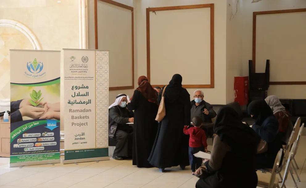 The MWL in Jordan distributes Ramadan Iftar coupons for Syrian refugees